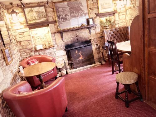 Bar/salonek, Inn For All Seasons Hotel in Burford Bar/salonek, Inn For All Seasons Hotel in Burford