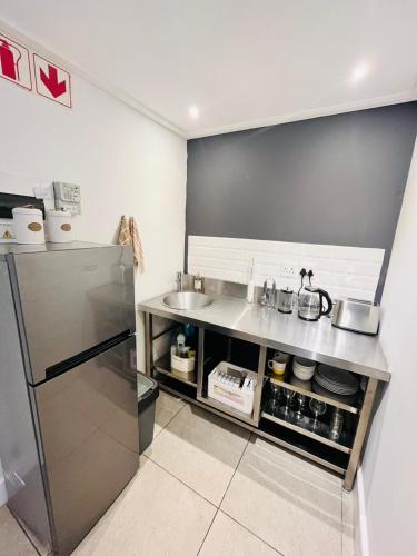 virtuve, 15 m² studio Dzīvoklis, ar 1 privātu vannas istabu Hermanusa
(Cosy Studio Apartment, Hermanus Waterfront) in Hērmanesa virtuve, 15 m² studio Dzīvoklis, ar 1 privātu vannas istabu Hermanusa
(Cosy Studio Apartment, Hermanus Waterfront) in Hērmanesa
