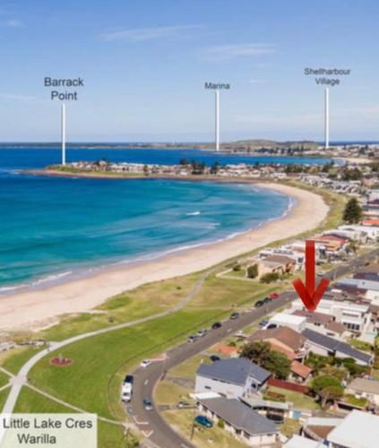 Beachfront Holiday Home with Late checkout in Lake Illawarra Beachfront Holiday Home with Late checkout in Lake Illawarra