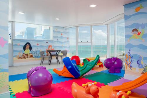 Детская площадка, Hotel Brisa Suites in Масейо Детская площадка, Hotel Brisa Suites in Масейо