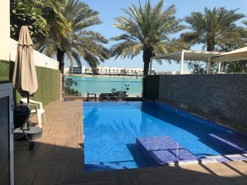 Swimming pool, Private pool with Beachfront access Villa in Amwaj Island Swimming pool, Private pool with Beachfront access Villa in Amwaj Island