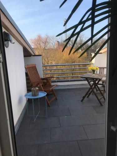 Dachgeschosszimmer mit Terrasse in Muhlenteich Dachgeschosszimmer mit Terrasse in Muhlenteich