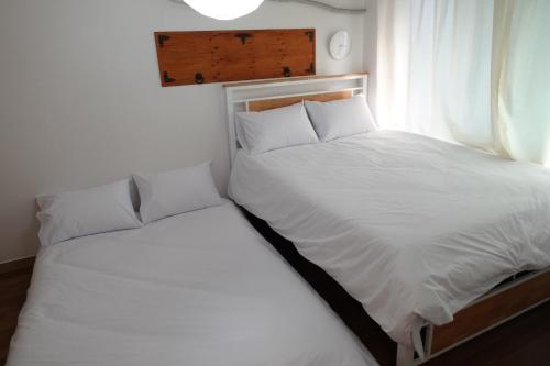 Bed, Hostel JL in Chung-jeong in Mapo Bed, Hostel JL in Chung-jeong in Mapo