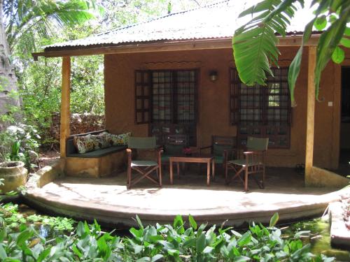 شرفة/ تراس, Boko Boko Guesthouse and Hotel in شاطىء بامبوري شرفة/ تراس, Boko Boko Guesthouse and Hotel in شاطىء بامبوري