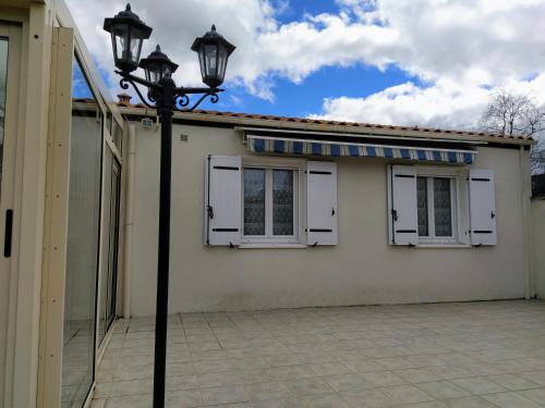 Instalaciones, Maison plain pied avec jardin, terrasse et veranda in Chateaubernard Instalaciones, Maison plain pied avec jardin, terrasse et veranda in Chateaubernard