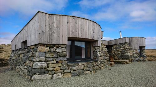 A szálláshely kívülről, Blackhouse Bothies in Balallan A szálláshely kívülről, Blackhouse Bothies in Balallan