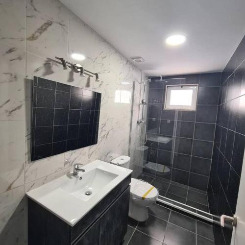 Baño, Casa de Férias_As Oliveiras II (Casa de Ferias_As Oliveiras II) in Espinho Baño, Casa de Férias_As Oliveiras II (Casa de Ferias_As Oliveiras II) in Espinho