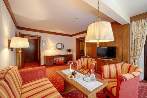 Pokoj pro hosty, Thermenwelt Hotel Pulverer in Bad Kleinkirchheim Pokoj pro hosty, Thermenwelt Hotel Pulverer in Bad Kleinkirchheim