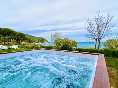 Pezsgőfürdő, Villa Tanaquilla in Punta Ala Pezsgőfürdő, Villa Tanaquilla in Punta Ala