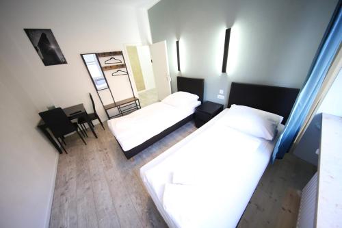 Ágy, LUXOMES: Aparthotel Nürnberg Zentrum Süd (LUXOMES: Aparthotel Nurnberg Zentrum Sud) in Nürnberg Ágy, LUXOMES: Aparthotel Nürnberg Zentrum Süd (LUXOMES: Aparthotel Nurnberg Zentrum Sud) in Nürnberg