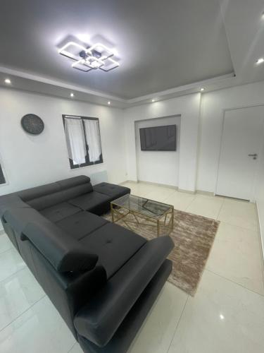 Shared lounge/TV area, Cosy house in Le Petit-Quevilly Shared lounge/TV area, Cosy house in Le Petit-Quevilly