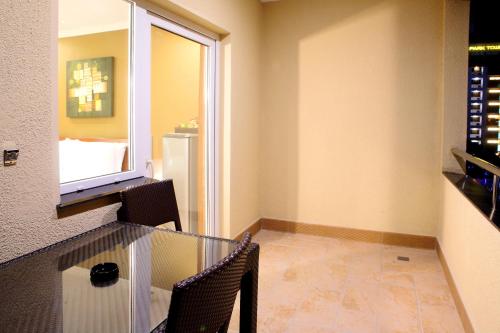 balkon/terasa, Queens Hotel in Angeles / Clark balkon/terasa, Queens Hotel in Angeles / Clark