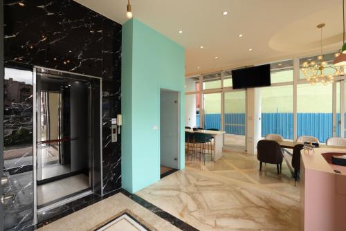 Shared lounge/TV area, 去七星潭-海景電梯民宿Qixingtan in Hsincheng Township Shared lounge/TV area, 去七星潭-海景電梯民宿Qixingtan in Hsincheng Township