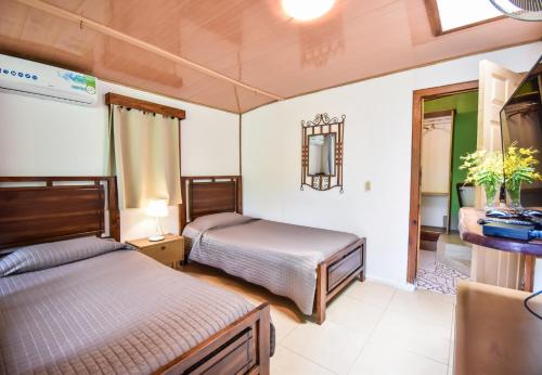 Cabinas Jacaranda in ปุเอร์โต วิเอโจ เดอ ทาลามันกา Cabinas Jacaranda in ปุเอร์โต วิเอโจ เดอ ทาลามันกา