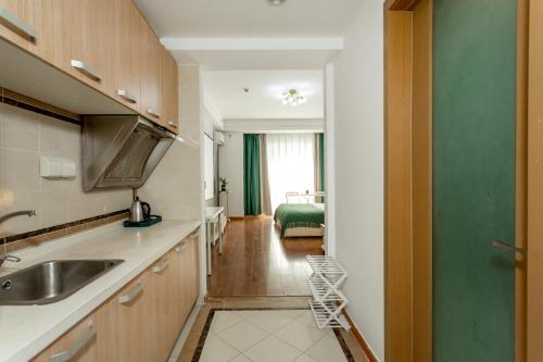 Dapur, Dalian Hong Xi Yuan Apartment Wanda Plaza in Software Business District Dapur, Dalian Hong Xi Yuan Apartment Wanda Plaza in Software Business District