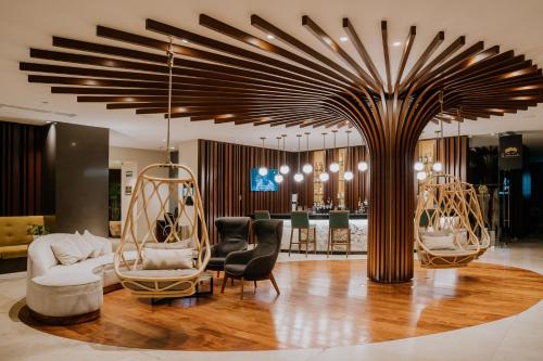 Lobby, The Reef 28 Hotel & Spa – Luxury Adults Only – All Suites – with optional All Inclusive. in Playa Del Carmen Lobby, The Reef 28 Hotel & Spa – Luxury Adults Only – All Suites – with optional All Inclusive. in Playa Del Carmen