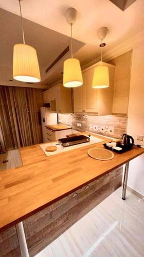Kitchen, WoodSea fascinated Apartment in Al Murjan Kitchen, WoodSea fascinated Apartment in Al Murjan