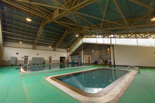 Bể bơi, Honeydewwz Exoticaa Hotel & Resort in Chikmagalur Bể bơi, Honeydewwz Exoticaa Hotel & Resort in Chikmagalur