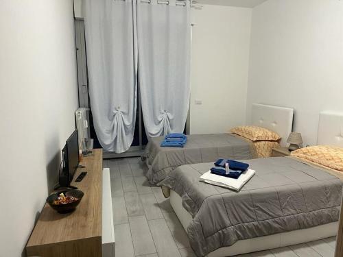 Guestroom, Einaudi Apartment in Cologno Monzese Guestroom, Einaudi Apartment in Cologno Monzese