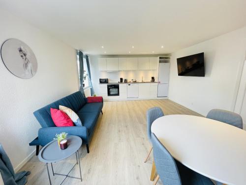 共用Lounge/電視區, aday - Blue Sea apartment with balcony in 腓特烈港市中心 共用Lounge/電視區, aday - Blue Sea apartment with balcony in 腓特烈港市中心
