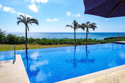 Swimming pool, Allamanda Imgya Coral Village in Shigira Beach Swimming pool, Allamanda Imgya Coral Village in Shigira Beach