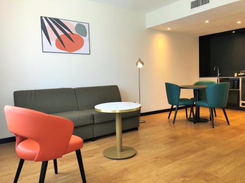Shared lounge/TV area, Novotel Suites Montpellier in Montpellier Shared lounge/TV area, Novotel Suites Montpellier in Montpellier