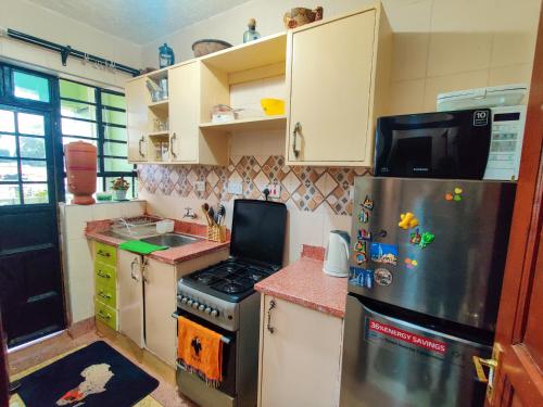 Kitchen, Modern & Comfy Mt. Kenya Sunset View Apartment in Embu Kitchen, Modern & Comfy Mt. Kenya Sunset View Apartment in Embu