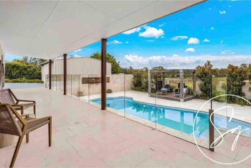 Balcony/terrace, Sophisticated Rural Living (Holiday Home) in Hawkesbury Valley Balcony/terrace, Sophisticated Rural Living (Holiday Home) in Hawkesbury Valley