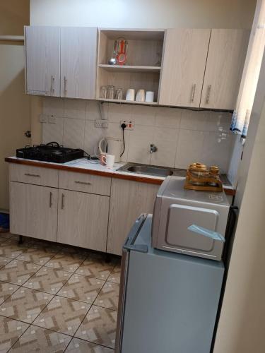 Κουζίνα, Emeli Suites in Ναϊρόμπι Κουζίνα, Emeli Suites in Ναϊρόμπι