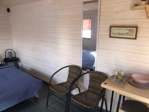 WOMOCAMP Holzhütte 2 with shared WC (WOMOCAMP Holzhutte 2 with shared WC) in Saulkrasti WOMOCAMP Holzhütte 2 with shared WC (WOMOCAMP Holzhutte 2 with shared WC) in Saulkrasti