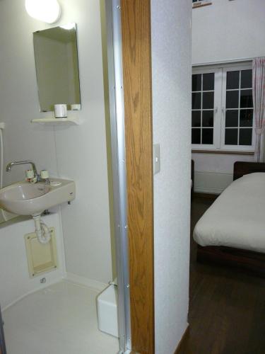 Salle de bain, Pension Ressha House near Furano Wine Factory Salle de bain, Pension Ressha House near Furano Wine Factory