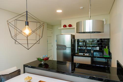 Cocina, Cielo Ejecutivo: Un hogar en la ciudad in Ciudad del este Cocina, Cielo Ejecutivo: Un hogar en la ciudad in Ciudad del este