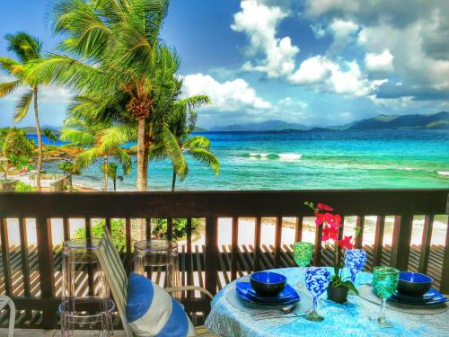 Balcony/terrace, Luxury Beachfront Duplex Villa on Sapphire Beach I in Red Hook Balcony/terrace, Luxury Beachfront Duplex Villa on Sapphire Beach I in Red Hook