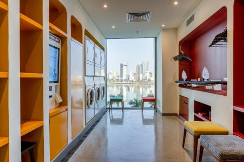 Shared lounge/TV area, Wink Icon Hotel Danang Riverside - 24hrs Stay & Rooftop Pool Bar in Da Nang Shared lounge/TV area, Wink Icon Hotel Danang Riverside - 24hrs Stay & Rooftop Pool Bar in Da Nang