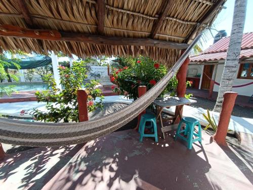 Balcony/terrace, Bungalows Familiares in Monterrico Balcony/terrace, Bungalows Familiares in Monterrico