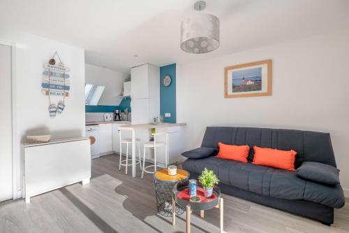 Közös társalgó / TV, Appartement vue mer et les pieds dans l'eau! in Pornichet Közös társalgó / TV, Appartement vue mer et les pieds dans l'eau! in Pornichet