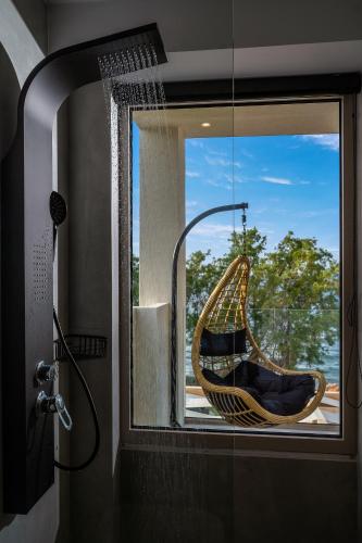 Shower, Milatos Seaside Suites in Vrachasi Shower, Milatos Seaside Suites in Vrachasi