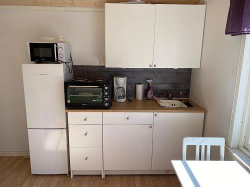 Kitchen, Sot liten stuga for 2 in Stromstad Kitchen, Sot liten stuga for 2 in Stromstad