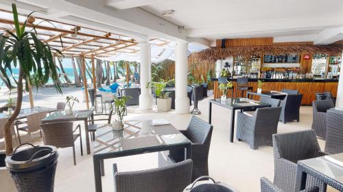 Restaurant, Villa Caemilla Beach Boutique Hotel in Station 3 Restaurant, Villa Caemilla Beach Boutique Hotel in Station 3