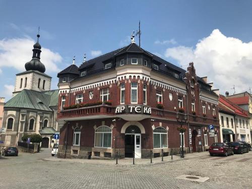 A szálláshely kívülről, Pokoje W Pięknej Kamienicy W Centrum W Głogówku (Pokoje W Pieknej Kamienicy W Centrum W Glogowku) in Moszna A szálláshely kívülről, Pokoje W Pięknej Kamienicy W Centrum W Głogówku (Pokoje W Pieknej Kamienicy W Centrum W Glogowku) in Moszna