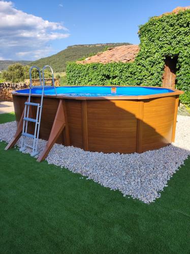 Úszómedence, masia riu dels arbres in Benassal Úszómedence, masia riu dels arbres in Benassal