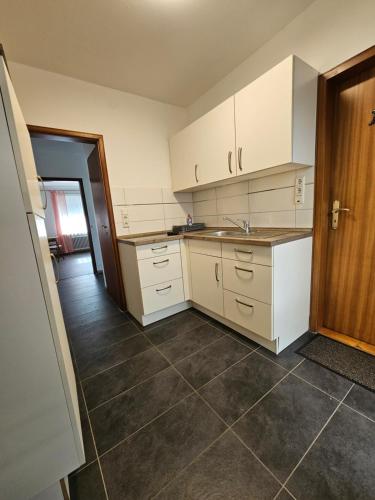 Kitchen, Ferienwohnung Mond&Wasser 1 in Norden Kitchen, Ferienwohnung Mond&Wasser 1 in Norden