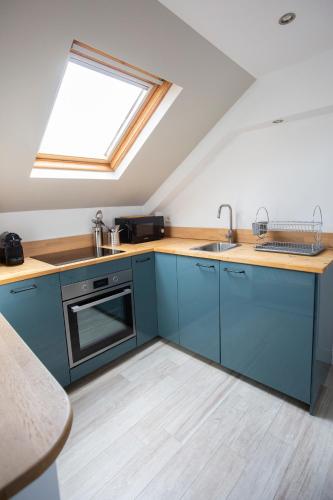 مطبخ, Modern apartement in the city center. in Poissy مطبخ, Modern apartement in the city center. in Poissy