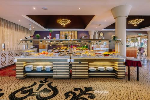 餐廳, 木圖俱樂部普拉亞達奧拉酒店 (Muthu Clube Praia da Oura) in 阿爾布菲拉 餐廳, 木圖俱樂部普拉亞達奧拉酒店 (Muthu Clube Praia da Oura) in 阿爾布菲拉