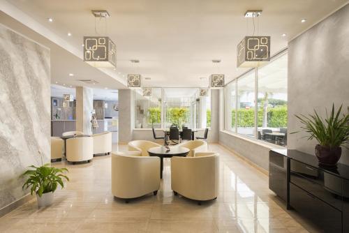 صالة مشتركة/ منطقة التلفزيون, Simon Hotel in Pomezia صالة مشتركة/ منطقة التلفزيون, Simon Hotel in Pomezia