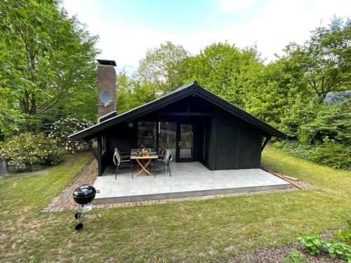 Erkély/terasz, Ferienhaus Kleine Auszeit in der Natur mit Kamin, Yogamatten, schöne Küche (Ferienhaus Kleine Auszeit in der Natur mit Kamin, Yogamatten, schone Kuche) in Extertal Erkély/terasz, Ferienhaus Kleine Auszeit in der Natur mit Kamin, Yogamatten, schöne Küche (Ferienhaus Kleine Auszeit in der Natur mit Kamin, Yogamatten, schone Kuche) in Extertal