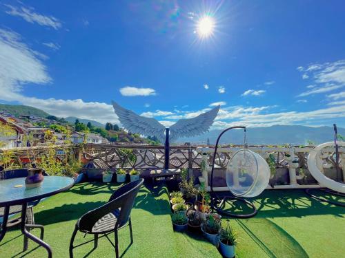 Балкон/тераса, Frida's Inn 丽江梦之旅观景客栈 in Лиджанг Балкон/тераса, Frida's Inn 丽江梦之旅观景客栈 in Лиджанг