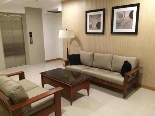 Shared lounge/TV area, Stone House Hotel Pasay near Baclaran LRT Station Shared lounge/TV area, Stone House Hotel Pasay near Baclaran LRT Station