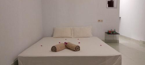 Bungalow avec 1 chambre(s) de 10 m² et 1 salle(s) de bains privée(s) à Gili Gede (Mango Homestay) in Gili Gede Bungalow avec 1 chambre(s) de 10 m² et 1 salle(s) de bains privée(s) à Gili Gede (Mango Homestay) in Gili Gede