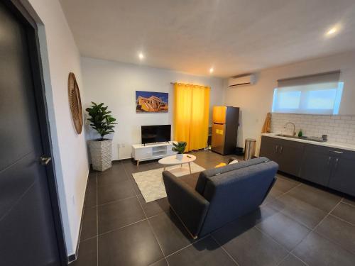 Modern sunshine yellow apartment with nature views in Tera Kora Modern sunshine yellow apartment with nature views in Tera Kora